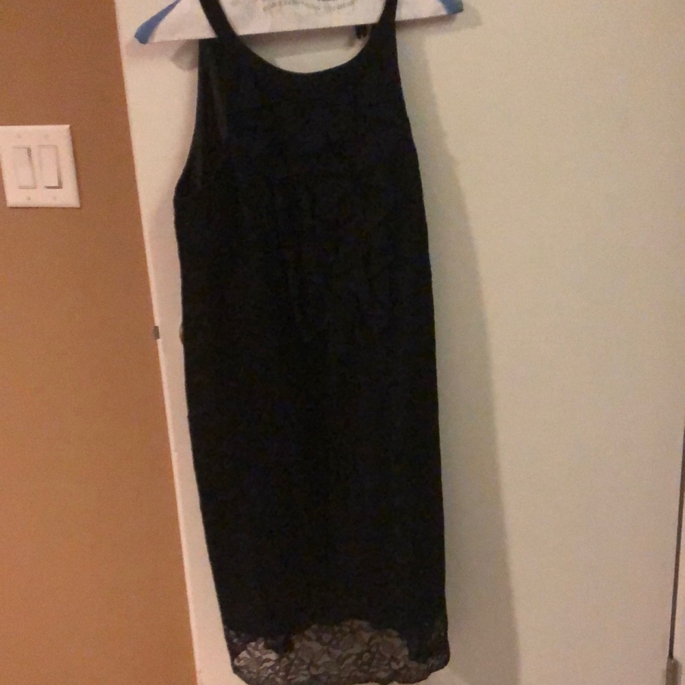 Lace black dress with ruffles down front